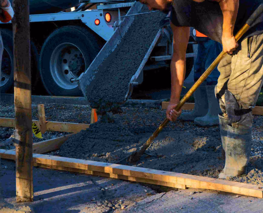 Kinsmen crew placing and finishing concrete on site